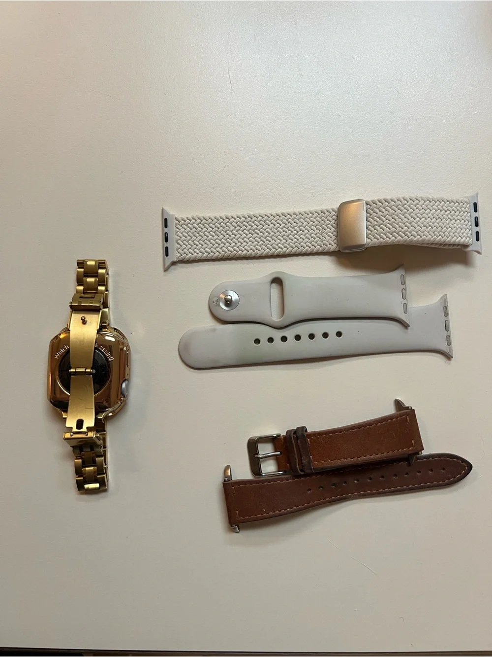 Apple silver stainless steel smartwatch with link band and case